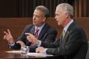 Wisconsin's Democratic candidate U.S. Senator Russ Feingold, left, and Republican challenger Ron Johnson, right, speak during a senate debate held at Marquette University Law School, Friday, Oct. 22, 2010, in Milwaukee. (AP Photo/Jeffrey Phelps)