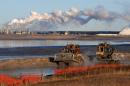 Emissions from Canada's oil sands will likely increase faster than new technologies can be developed to curb them, says a government document