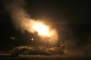An Israeli artillery gun fires a 155 mm shell towards targets in the Gaza Strip from their position near Israel's border with the Gaza Strip on July 31, 2014