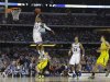Kansas guard Ben McLemore (23) dunks against Michigan during the second half of a regional semifinal game in the NCAA college basketball tournament, Friday, March 29, 2013, in Arlington, Texas. (AP Photo/Tony Gutierrez)