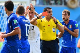 Referee Marco Rodriguez shows a red card to Claudio Marchisio of Italy. (Getty)