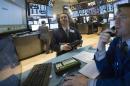 Traders work on the floor of the New York Stock Exchange