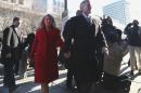 Former Virginia Gov. Bob McDonnell and his wife Maureen arrive at the U.S. District Court in Richmond on Friday, Jan. 24, 2014, for his and his wife Maureen's bond hearing and arraignment on Friday, Jan. 24, 2014 on federal corruption charges. Federal prosecutors allege that the McDonnells accepted more than $165,000 worth of loans and gifts from Jonnie Williams, the former head of Star Scientific Inc. (AP Photo/The Virginian-Pilot, Steve Earley) MAGS OUT