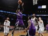 Sacramento Kings' Thomas Robinson shoots over Brooklyn Nets in NBA game in New York