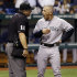 New York Yankees manager Joe Girardi, right, argues with home plate umpire Tony Randazzo after being ejected during the fourth inning of a baseball game against the Tampa Bay Rays, Tuesday, Sept. 4, 2012, in St. Petersburg, Fla. Girardi was arguing a strike call on Chris Dickerson. (AP Photo/Chris O'Meara)