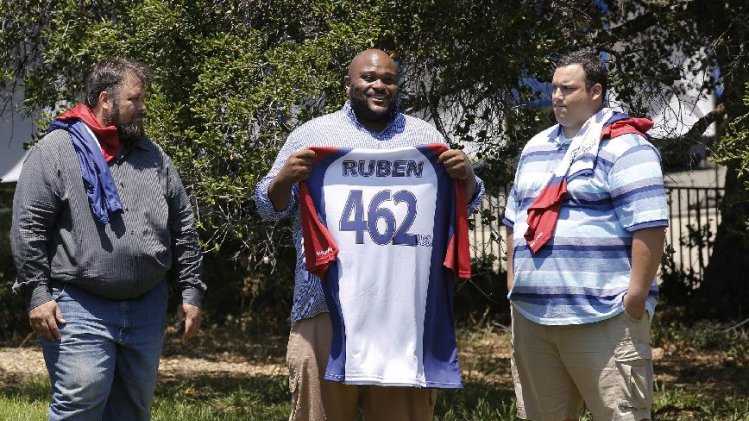 This image released by NBC shows, from left, David Brown, Ruben Studdard, and Hap Holmstead on "The Biggest Loser," in Calbasas, Calif. Studdard, the season two winner of "American Idol" is the 15th season’s heaviest contestant at 462 pounds. “The Biggest Loser” returns Oct. 8 at 8 p.m on NBC. (AP Photo/NBC, Trae Patton/NBC)