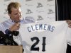 Roger Clemens holds up his new jersey during a news conference officially announcing his signing with the Sugar Land Skeeters baseball team Tuesday, Aug. 21, 2012, in Sugar Land, Texas. Clemens, a seven-time Cy Young Award winner, signed with the Skeeters of the independent Atlantic League on Monday and is expected to start for the minor league team on Saturday at home against Bridgeport. (AP Photo/David J. Phillip)