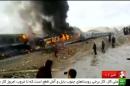 Still frame taken from video show people gathering around two passenger trains that collided in the city of Shahroud, in the north-central province of Semnan, Iran