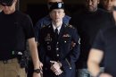 FILE - In this July 30, 2013 file photo, Army Pfc. Bradley Manning is escorted out of a courthouse in Fort Meade, Md. Manning is expected to give a statement Wednesday, Aug. 14, 2013, during the sentencing phase of his court-martial for leaking military and diplomatic secrets. (AP Photo/Patrick Semansky, File)