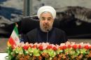 Iranian President Hassan Rouhani addresses the opening session of a two-day ministerial conference of the Economic Cooperation Organisation (ECO), in Tehran on November 26, 2013