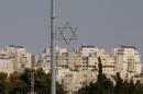A general view shows a Star of David near buildings in the Israeli settlement of Maale Edumim, in the occupied West Bank
