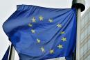 An European flag flies at the entrance of the EU Commission Berlaymont building in Brussels on May 21, 2014