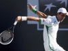 Djokovic of Serbia returns a shot to Dimitrov of Bulgaria at the BNP Paribas Open ATP tennis tournament in Indian Wells, California