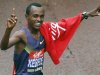 Olympic bronze medallist Kebede of Ethiopia celebrates after winning his seventh successive London men's marathon title in London