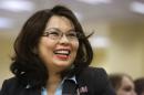 FILE - In this Aug. 13, 2014 file photo, U.S. Rep. Tammy Duckworth, D-Ill., appears at annual state fair Governor's Day brunch in Springfield, Ill. Duckworth says Monday, March 30, 2015 that she'll run for U.S. Senate in 2016, setting up a high-profile challenge to Republican Sen. Mark Kirk's re-election bid. (AP Photo/Seth Perlman, File)