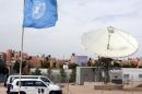 UN vehicles are parked outside the headquarters of the United Nations Mission for the Referendum in Western Sahara on May 13, 2013 in Laayoune, the main city in the disputed territory