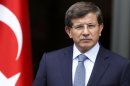 Turkey's Foreign Minister Davutoglu addresses the media in Ankara