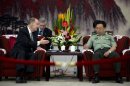 U.S. National Security Adviser Tom Donilon, left, talks with Gen. Fan Changlong, right, vice chairman of China's Central Military Commission, during their meeting at the Bayi Building, headquarters of Chinese Defense Ministry, in Beijing Tuesday, May 28, 2013. (AP Photo/Alexander F. Yuan, Pool)