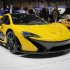 People look at the new McLaren P1 during the 83rd Geneva International Motor Show, Switzerland, Monday, March 4, 2013. The Motor Show will open its gates to the public from March 7 to 17.  (AP Photo/Laurent Cipriani)