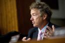 In this photo taken July 23, 2015, Republican presidential candidate, Sen. Rand Paul, R-Ky., speaks on Capitol Hill in Washington. Paul says Senate leaders have told him the chamber will vote on his effort to block federal aid to Planned Parenthood before lawmakers begin their August break. (AP Photo/Andrew Harnik)