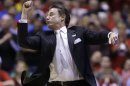 Louisville head coach Rick Pitino directs his team during the second half of the Midwest Regional final against Duke in the NCAA college basketball tournament, Sunday, March 31, 2013, in Indianapolis. Louisville won 85-63 to advance to the Final Four. (AP Photo/Michael Conroy)