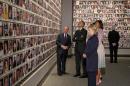 President Barack Obama and first lady Michelle Obama, along with former Secretary of State Hillary Rodham Clinton and former President Bill Clinton tour the Memorial Hall at the National September 11 Memorial Museum with former New York Mayor Michael Bloomberg, Thursday, May 15, 2014, in New York. (AP Photo/Carolyn Kaster)