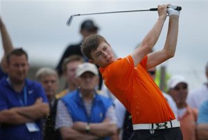 Amateur Matthew Fitzpatrick of England watches his tee shot during a practice round ahead of the British Open golf championship at Muirfield in Scotland