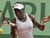 USA's Sloane Stephens returns the ball to France's Mathilde Johansson during their third round match in the French Open tennis tournament at the Roland Garros stadium in Paris, Friday, June 1, 2012.  (AP Photo/Michel Spingler)