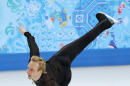 Evgeni Plushenko of Russia competes in the men's team free skate figure skating competition at the Iceberg Skating Palace during the 2014 Winter Olympics, Sunday, Feb. 9, 2014, in Sochi, Russia. (AP Photo/Vadim Ghirda)