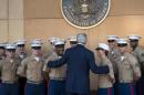 US Secretary of State John Kerry greets US marines as he arrives at the US embassy in the International Zone June 23, 2014 in the Iraqi capital Baghdad