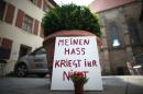 A sign reads "You don't get my hate" in Ansbach on July 26, 2016, days after a Syrian asylum seeker blew himself up outside a music festival in the city