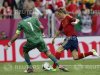Spain's Torres controls the ball next to Italy's goalkeeper Buffon during their Group C Euro 2012 soccer match at the PGE Arena in Gdansk