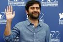 Director Emin Alper attends the photocall for the movie "Abluka" (Frenzy) at the 72nd Venice Film Festival, northern Italy