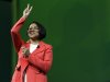 CORRECTS FIRST NAME TO ROSALIND INSTEAD OF ROZ - Sam's Club President and CEO Rosalind Brewer reacts to a crowd celebration during the Wal-Mart  shareholders meeting in Fayetteville, Ark., Friday, June 7, 2013. (AP Photo/Gareth Patterson)