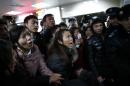 Relatives try to seek information at a hospital where those injured in a stampede are being treated in Shanghai, China, Thursday Jan. 1, 2015. Dozens died in a stampede during New Year's celebrations in downtown Shanghai, city officials said - the worst disaster to hit one of China's showcase cities in recent years. (AP Photo) CHINA OUT