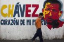 Un dipinto murale che ritrae il presidente del Venezuela Hugo Chavez