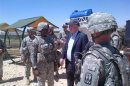 U.S. Senator John McCain is pictured with U.S. troops at a Patriot missile site in southern Turkey