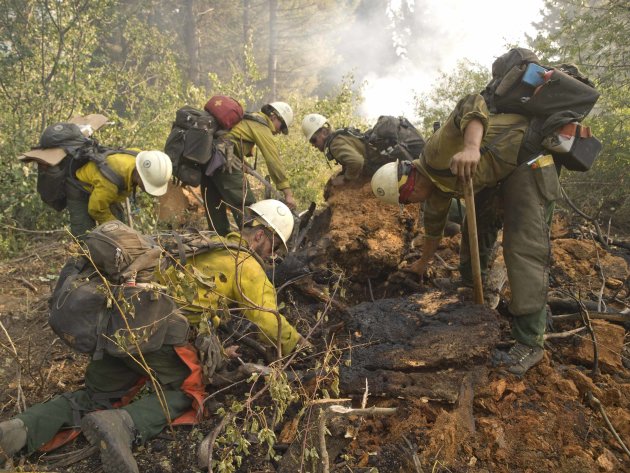 Handout of U.S. Forest Service firefighters working on the Springs Fire in Boise National Forest near Banks-Garden Valley