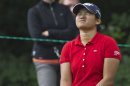 Yani Tseng of Taiwan reacts to her putt on the second green during the LPGA Canadian Women's Open golf tournament in Coquitlam