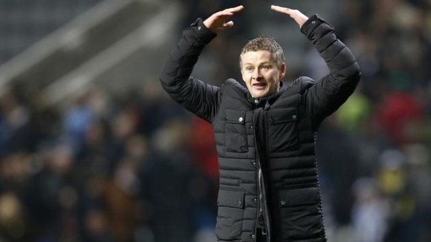Cardiff City's manager Ole Gunnar Solskjaer celebrates with the team's fans following their English FA Cup match against Newcastle United at St James' Park (Reuters)