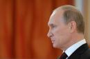 Russia's President Vladimir Putin as he attends a ceremony at the Grand Kremlin Palace in Moscow, on June 27, 2014