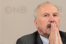 Austrian National Bank governor Ewald Nowotny reacts as he addresses a news conference in Vienna