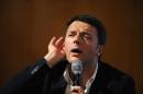 Florence mayor Matteo Renzi gestures during a political meeting in Turin