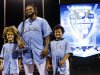 American League's Prince Fielder, of the Detroit Tigers, poses with his children Jaden, left, and Haven after receiving the MLB All-Star baseball Home Run Derby trophy, Monday, July 9, 2012, in Kansas City, Mo. (AP Photo/Charlie Riedel)