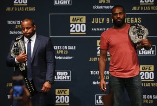 Daniel Cormier and Jon Jones pose during a UFC 200 media conference. (Getty)