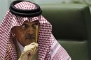 Saudi Foreign Minister Prince Saud Al-Faisal gestures during a joint news conference with his Egyptian counterpart Mohamed Kamel Amr in Riyadh