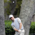 Graeme McDowell, of Northern Ireland, chips onto the second green during the final round of the RBC Heritage golf tournament in Hilton Head Island, S.C., Sunday, April 21, 2013. (AP Photo/Stephen Morton)