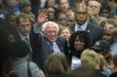 Democratic presidential candidate Bernie Sanders makes his way through a crowd before he speaks at the Jim Clyburn Fish Fry, on Saturday, Jan. 16, 2016, at the Charleston Visitor Center in Charleston, S.C. (AP Photo/Stephen B. Morton)