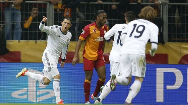 Cristiano Ronaldo (L) celebrates after scoring a goal against Galatasaray during their Champions League quarter-final second leg soccer match in Istanbul April 9, 2013 (Reuters)