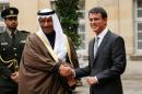 Kuwaiti Prime Minister Sheikh Jaber al-Mubarak al-Sabah (L) and French Prime Minister Manuel Valls pose before a meeting at the Hotel Matignon on October 21, 2015 in Paris